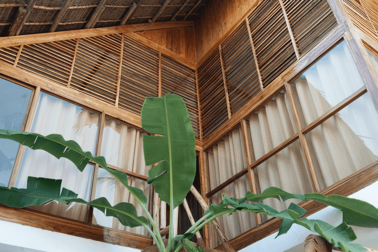 Interior view of wooden structure with bamboo roof